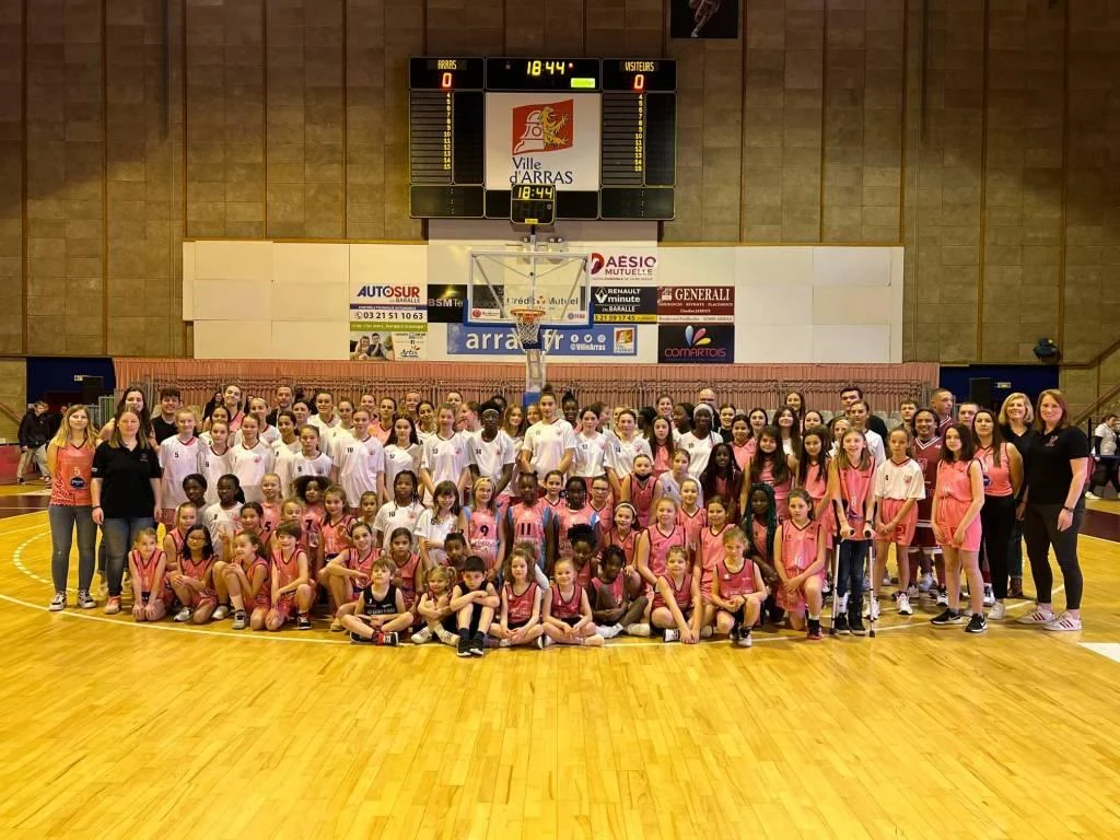 Arras women's basketball club community gathering with young players, coaches and supporters at the indoor basketball arena in France.